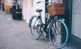 bicycle parked against a wall