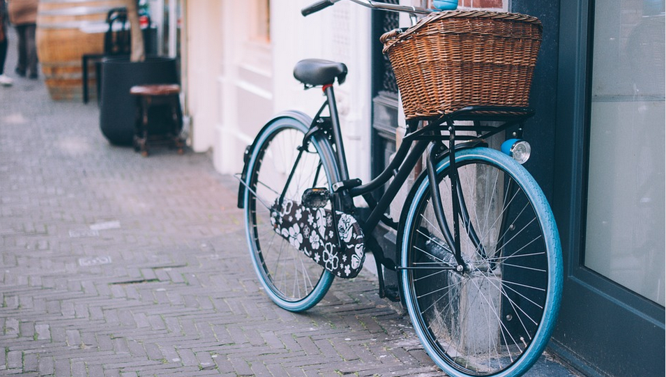 bicycle parked against a wall
